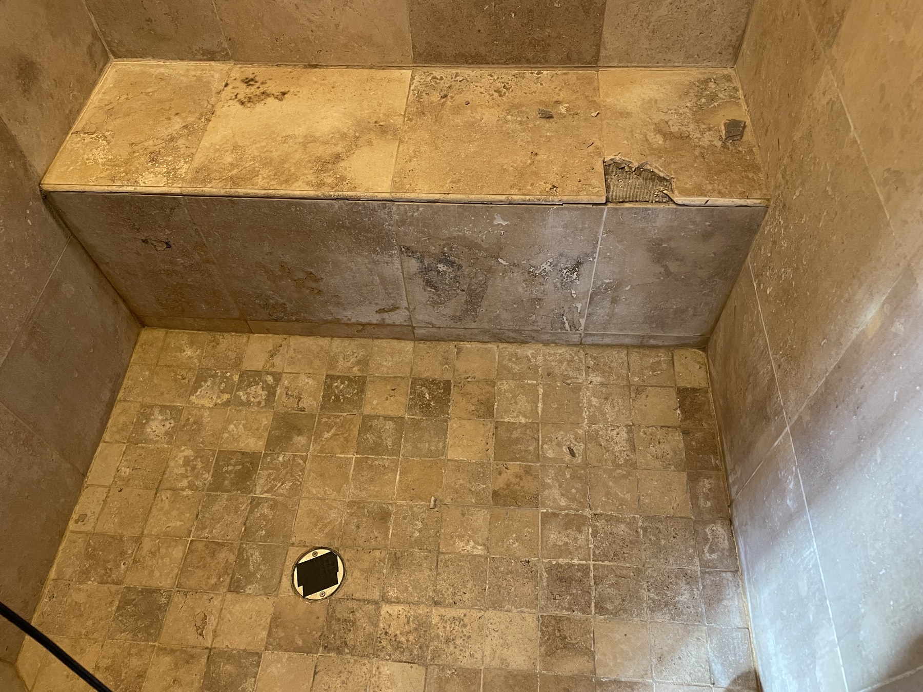 Shower tile repair — before
