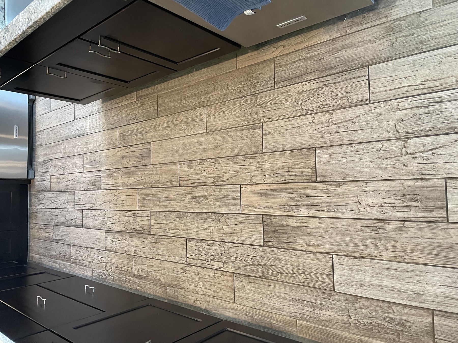 Wood-look tile grout clean — before